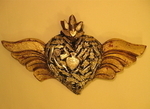 Sacred Heart with Wings and Milagros
